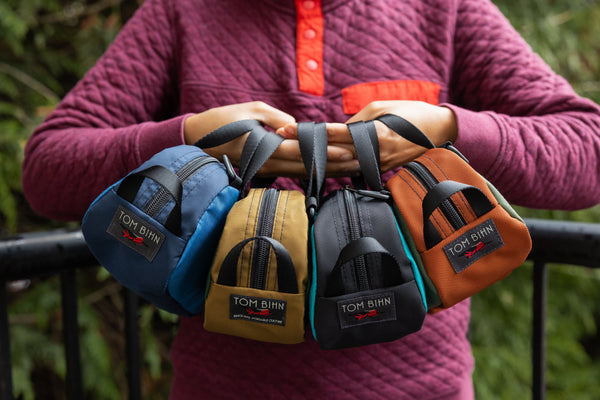 An assortment of Grab Bags being held by a person